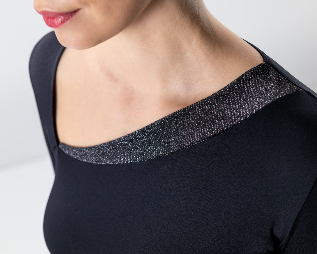 Detail image of the asymmetrical neckline of the Rida dance top by Werner Kern