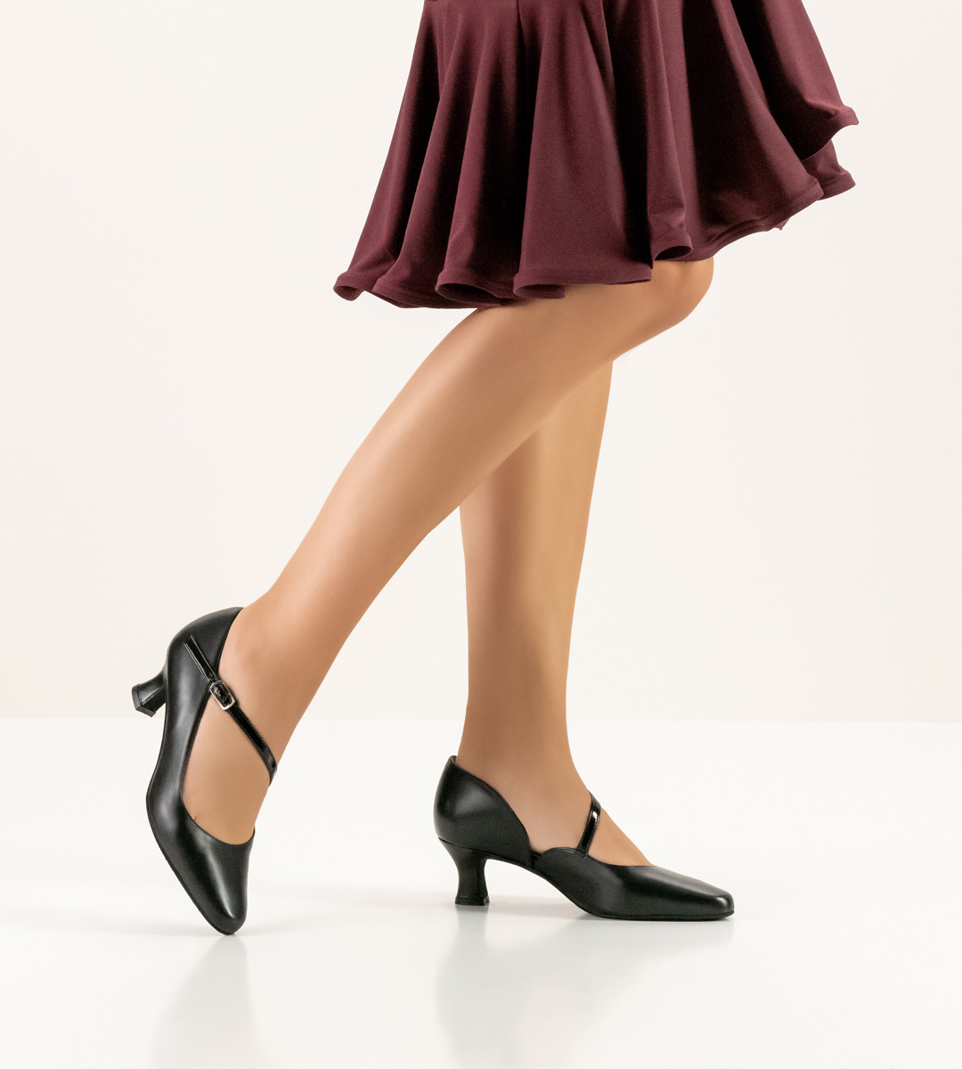 classic Werner Kern ladies dance shoe in combination with red skirt