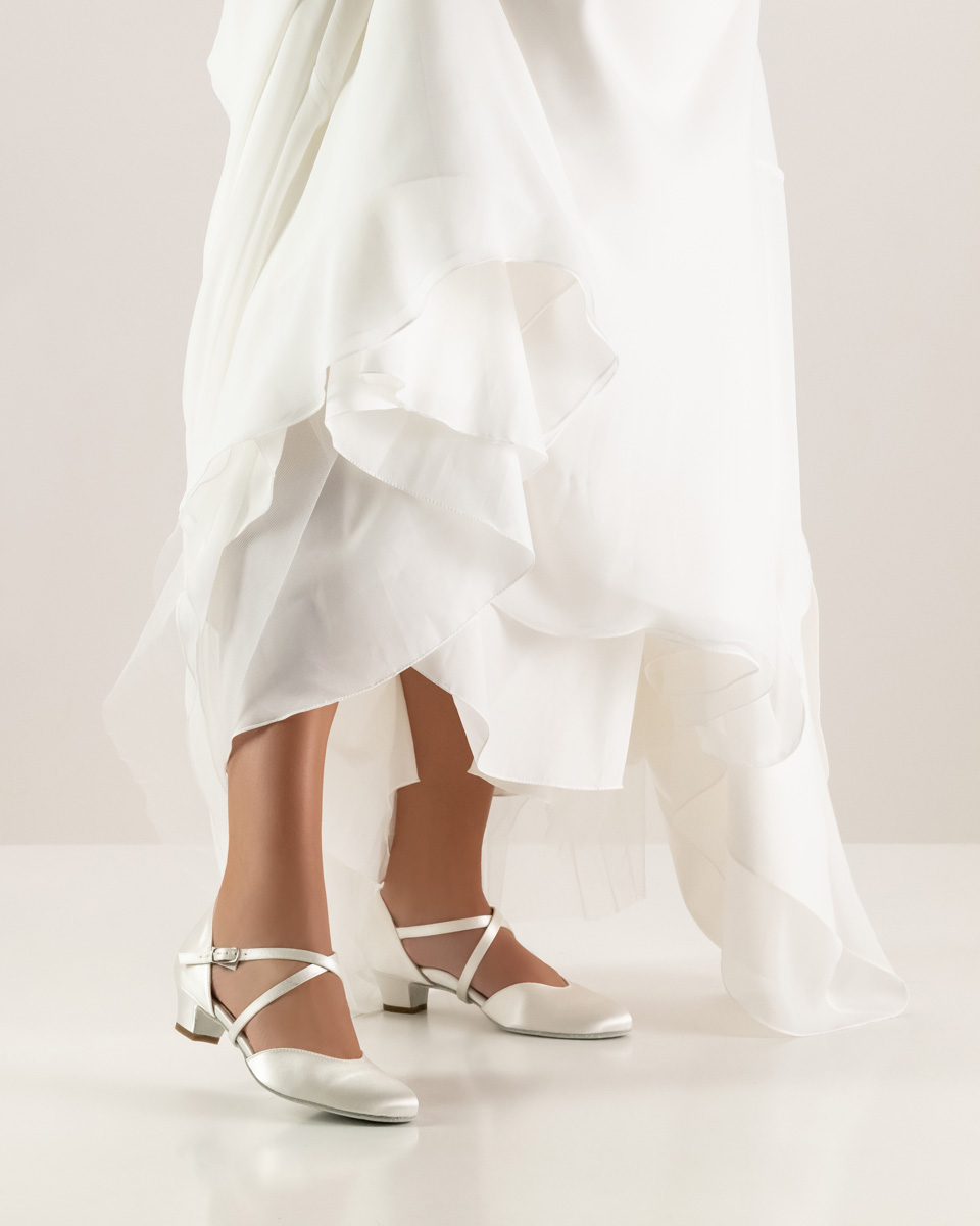 Satin bridal shoe by Werner Kern in combination with white dress