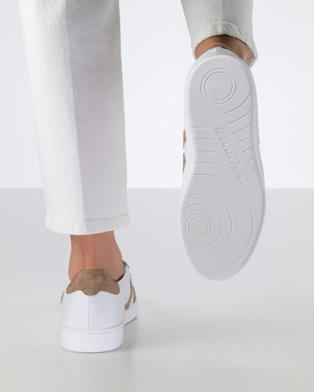 White dance trainer sole with pivot points by Werner Kern
