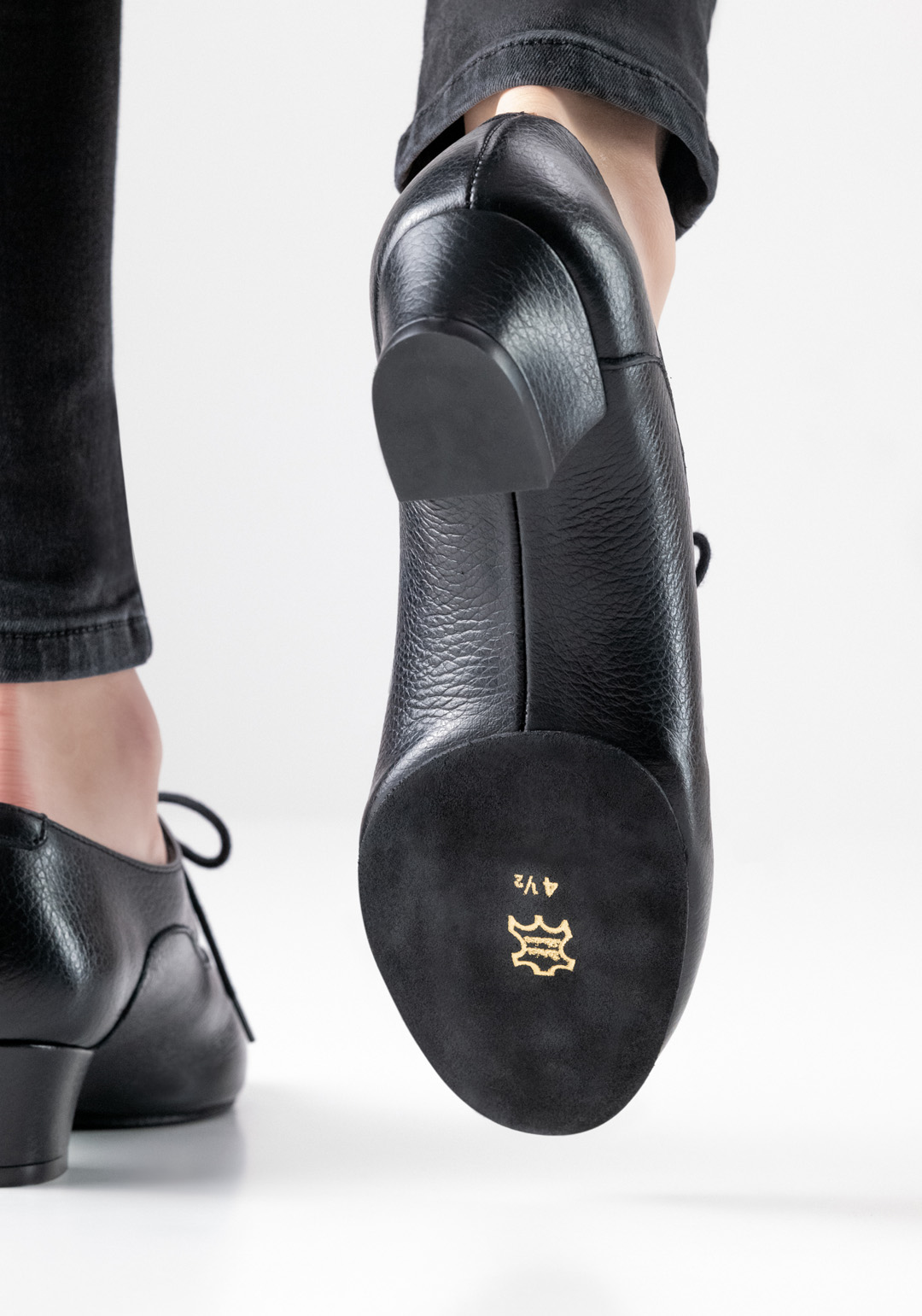 Split dance shoe sole in black and small block heel