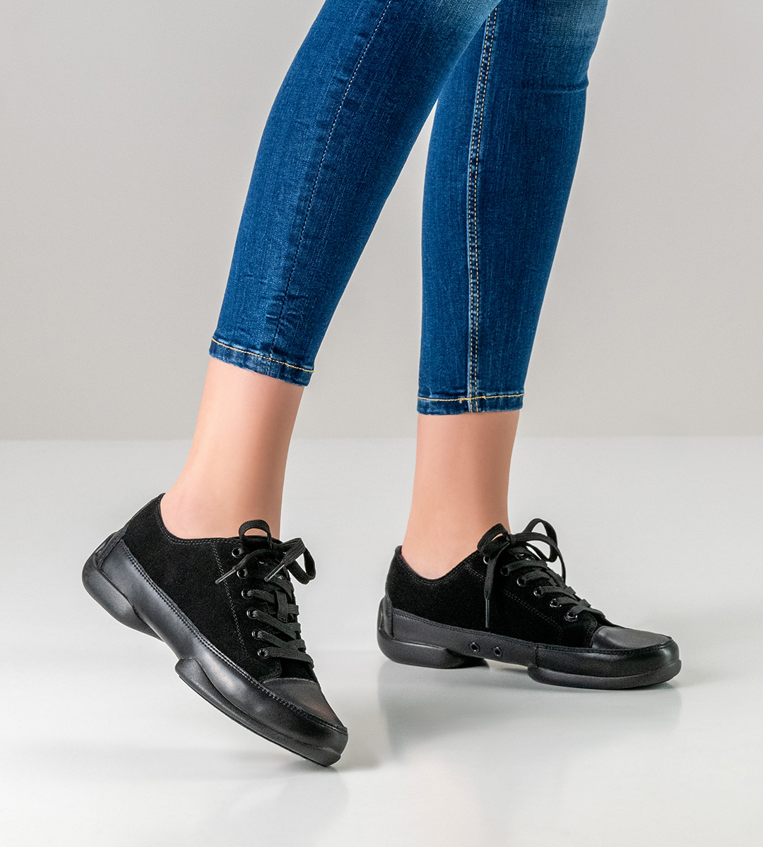 blue jeans in combination with black leather dance sneaker for women