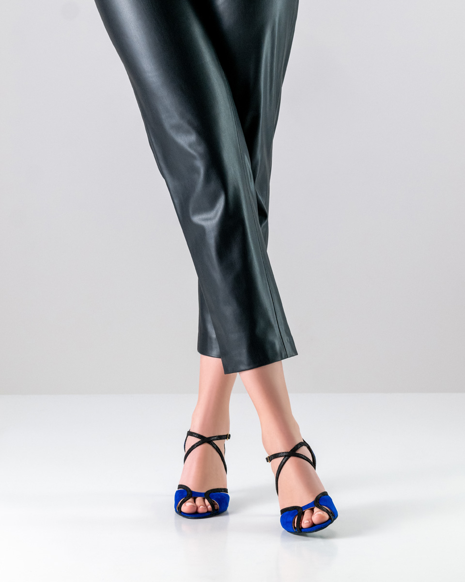 Pants in combination with ladies' dance shoes by Nueva Epoca in suede
