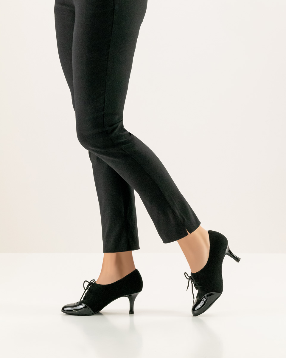 Women's dance shoe by Werner Kern in velvet goat and patent in combination with black trousers