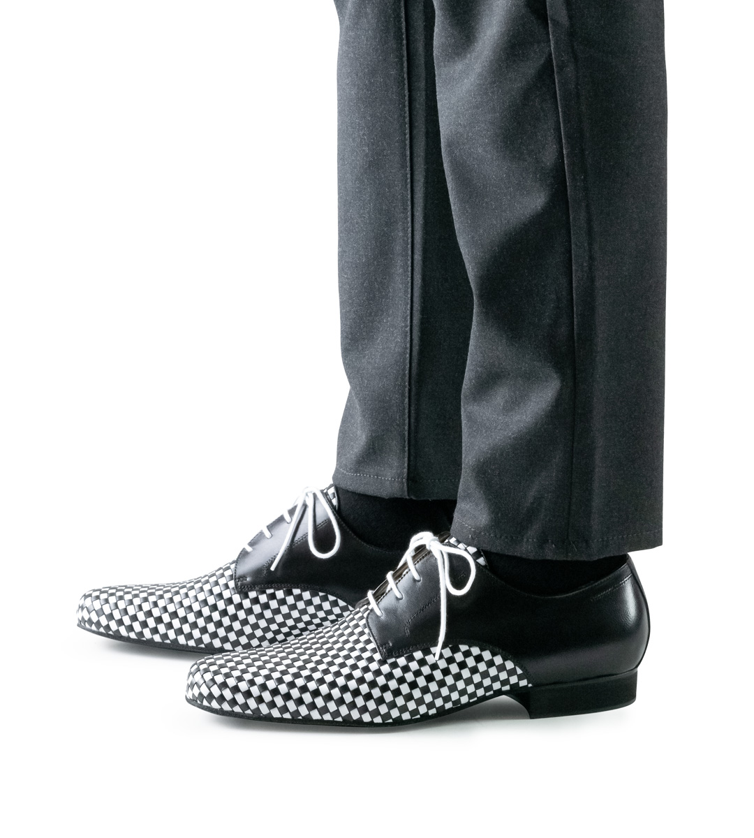 Braided men's dance shoe by Nueva Epoca in combination with grey trousers