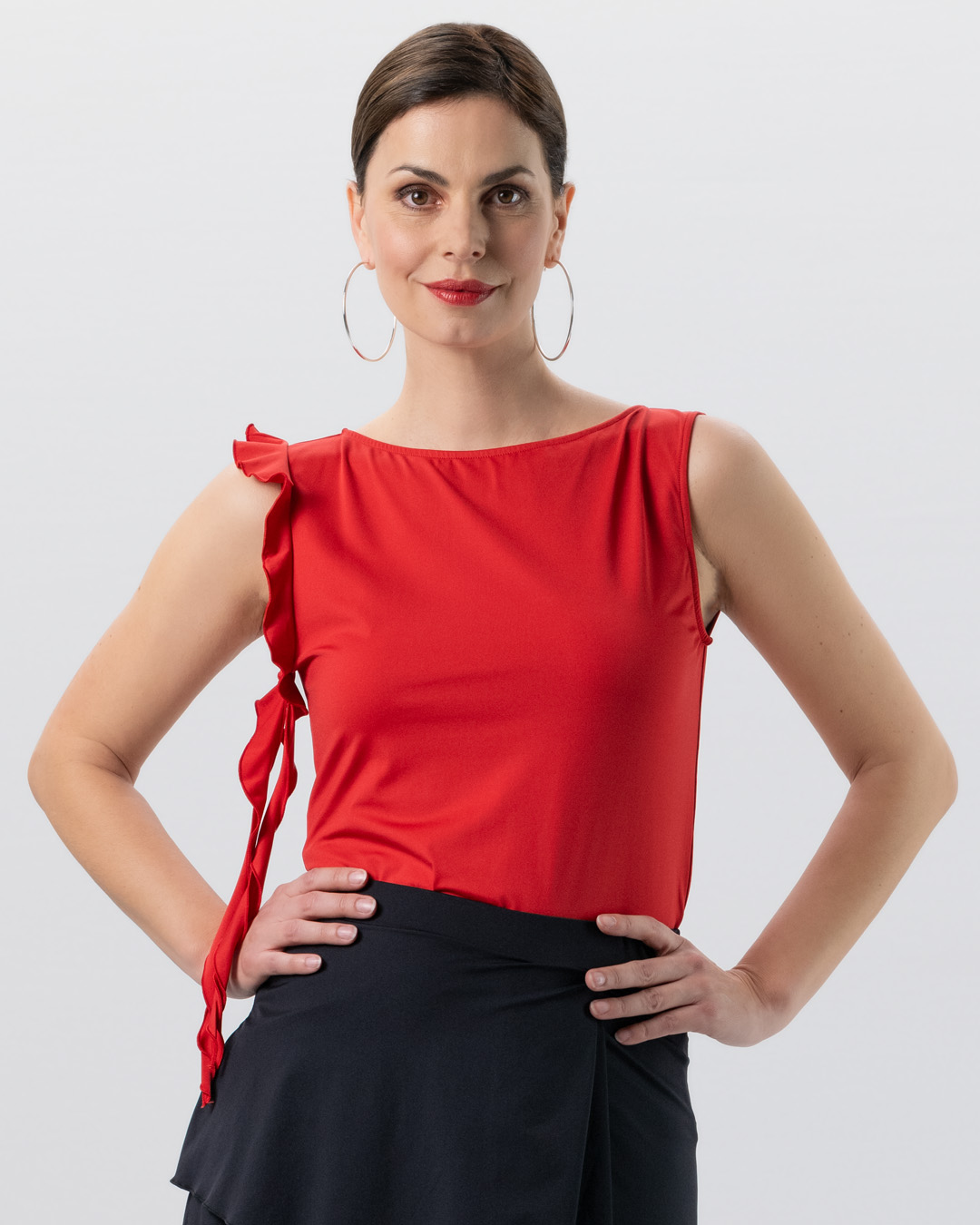 Red dance top by Werner Kern with small ruffle detail on the right armhole