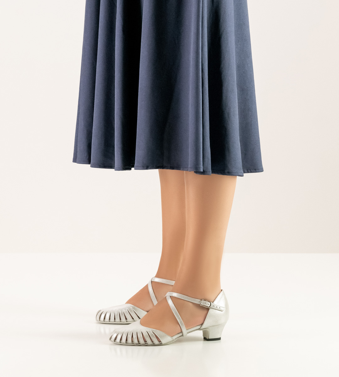 Women's dance shoe by Werner Kern in silver combined with blue skirt