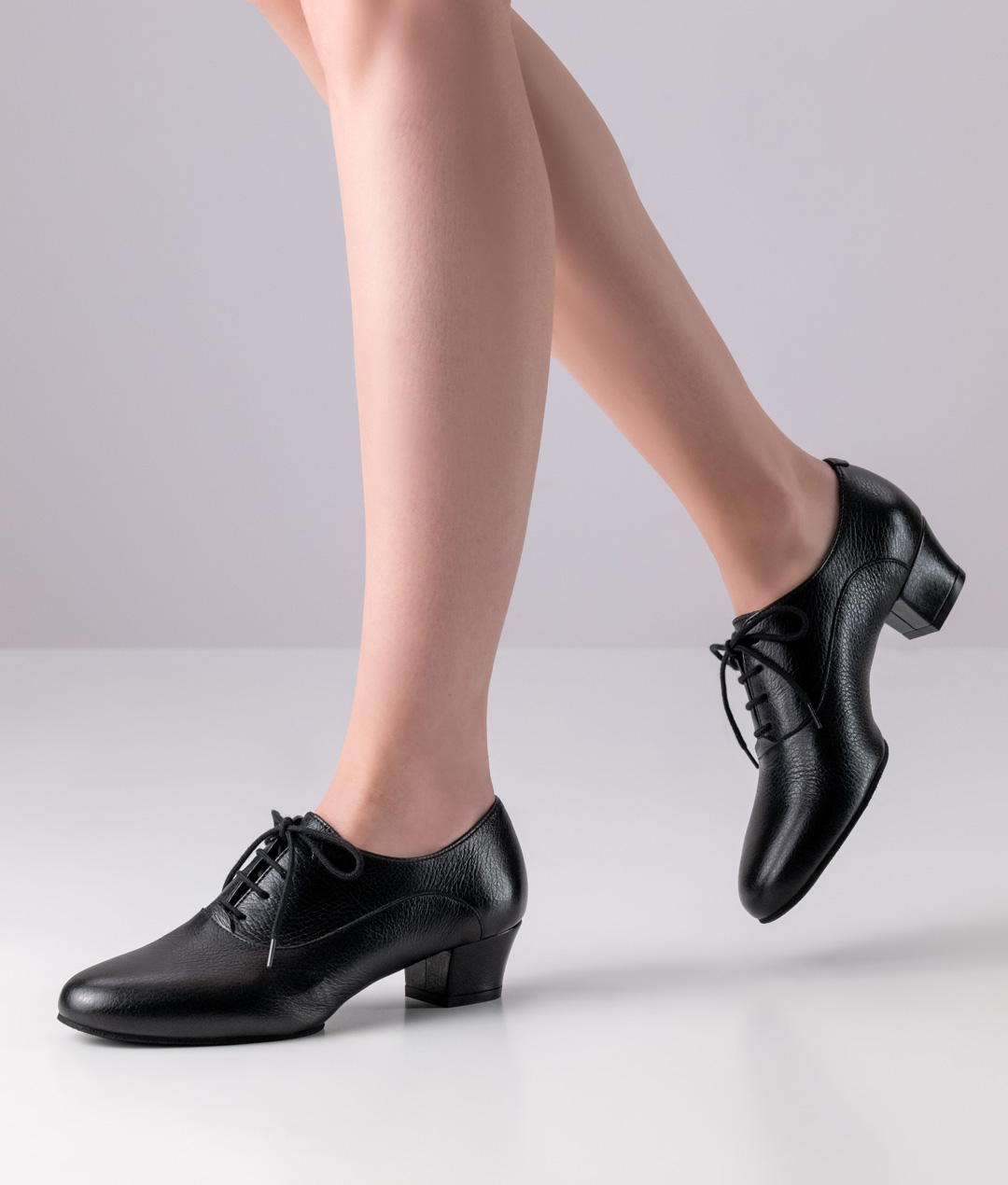 Lace-up dance shoe with small comfort heel in 3.5 cm height made of black deerskin by Werner Kern.