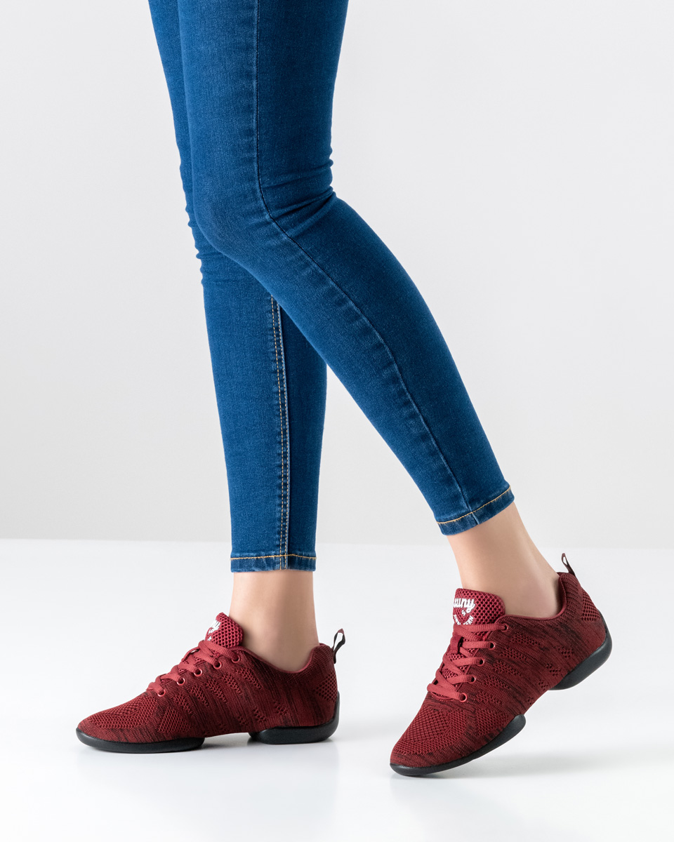 Women's dance sneakers by Suny in combination with blue jeans