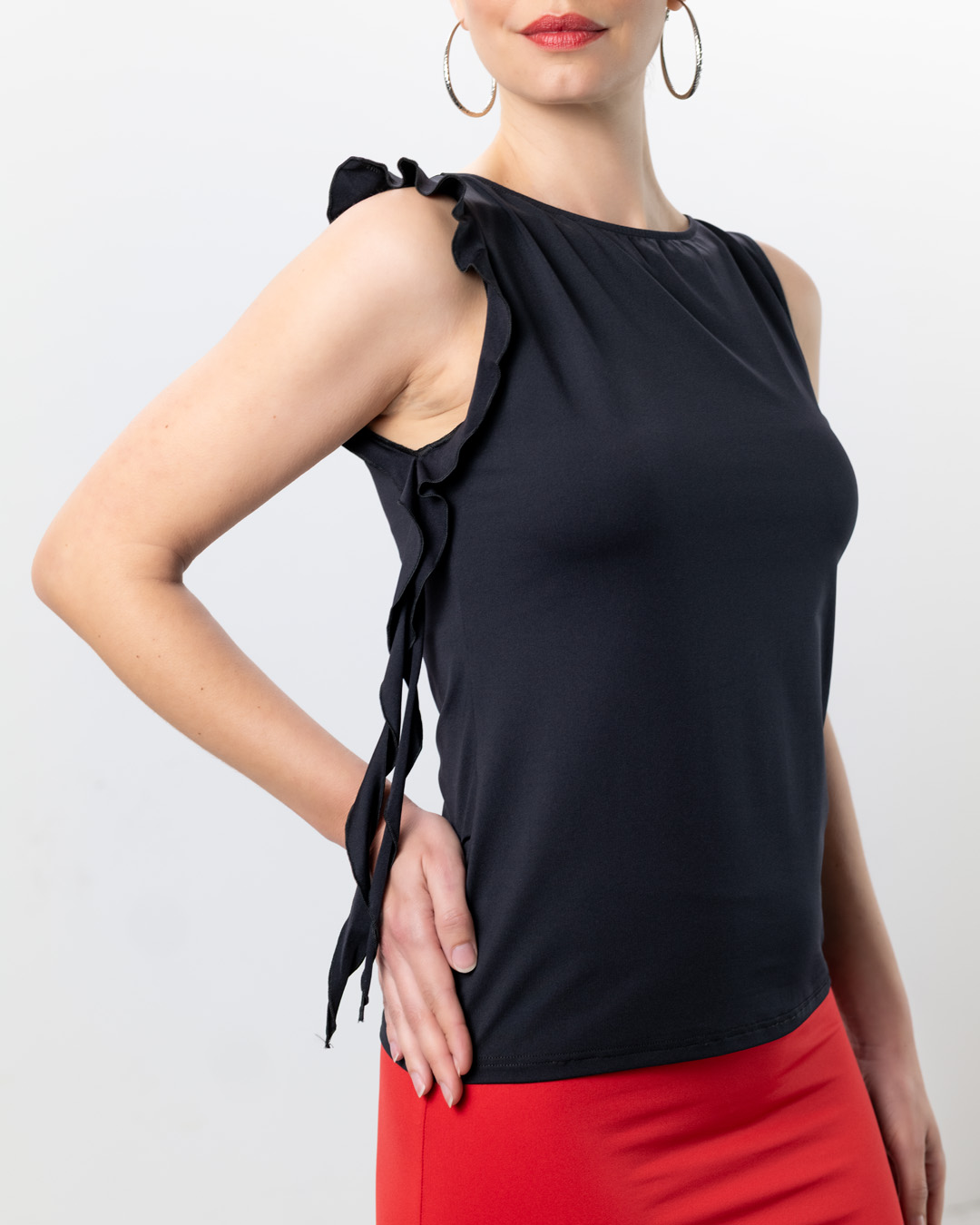 Asymmetrical, sleeveless women's dance top Lior in black with ruffle detail by Werner Kern