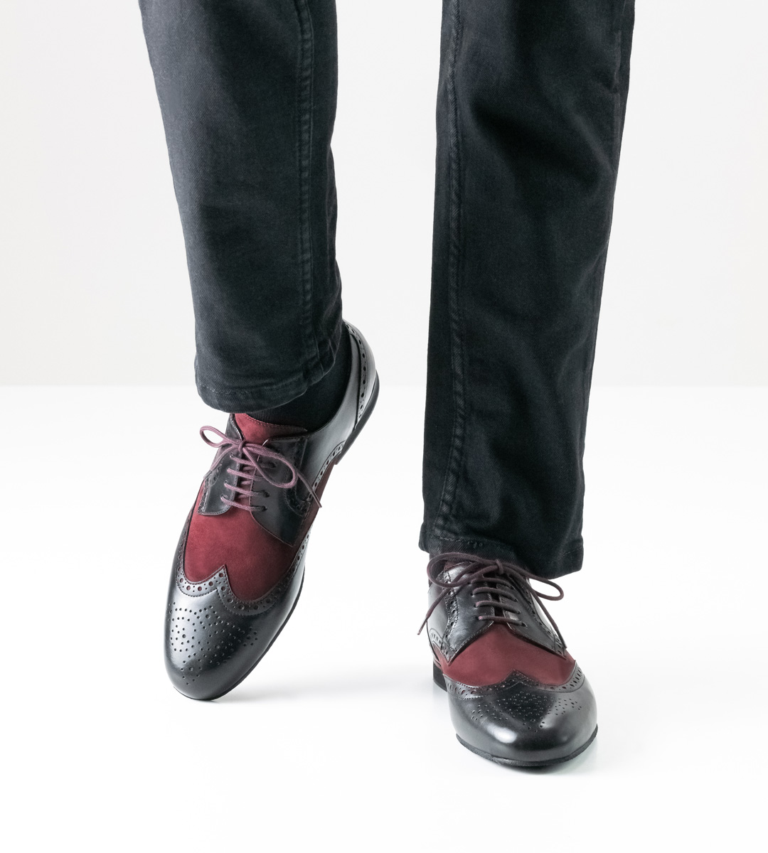 black jeans in combination with Werner Kern men's dance shoe with Budapest pattern