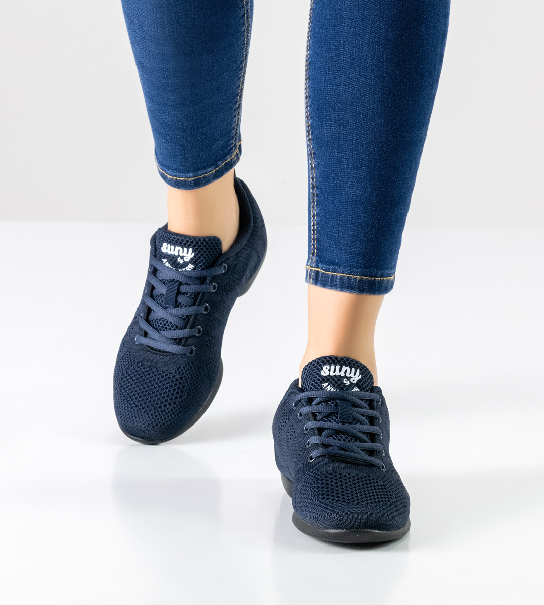 Blue jeans in combination with blue Suny women's dance sneakers for training