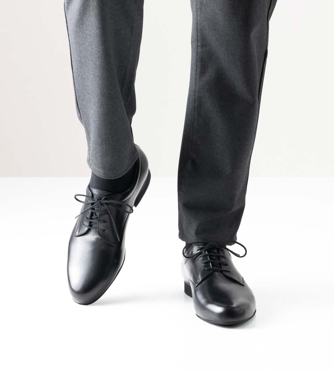 Lucca Werner Kern Men's Dance Shoe in Black Leather in Combination with Black Trousers