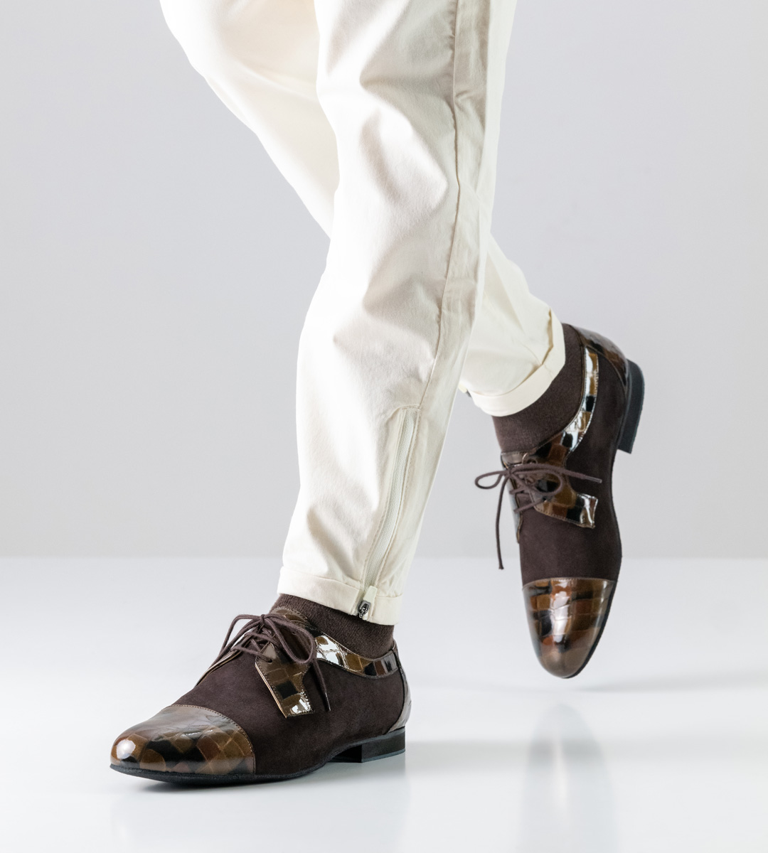 Men's dance shoe by Werner Kern in combination with light trousers