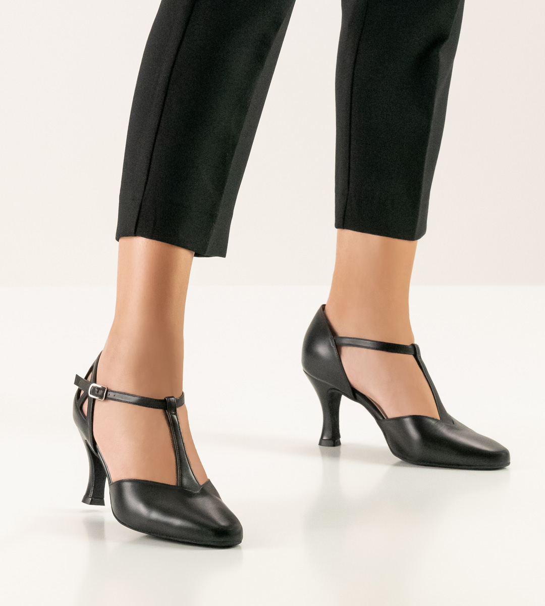 closed Werner Kern ladies dance shoe in black in combination with black trousers