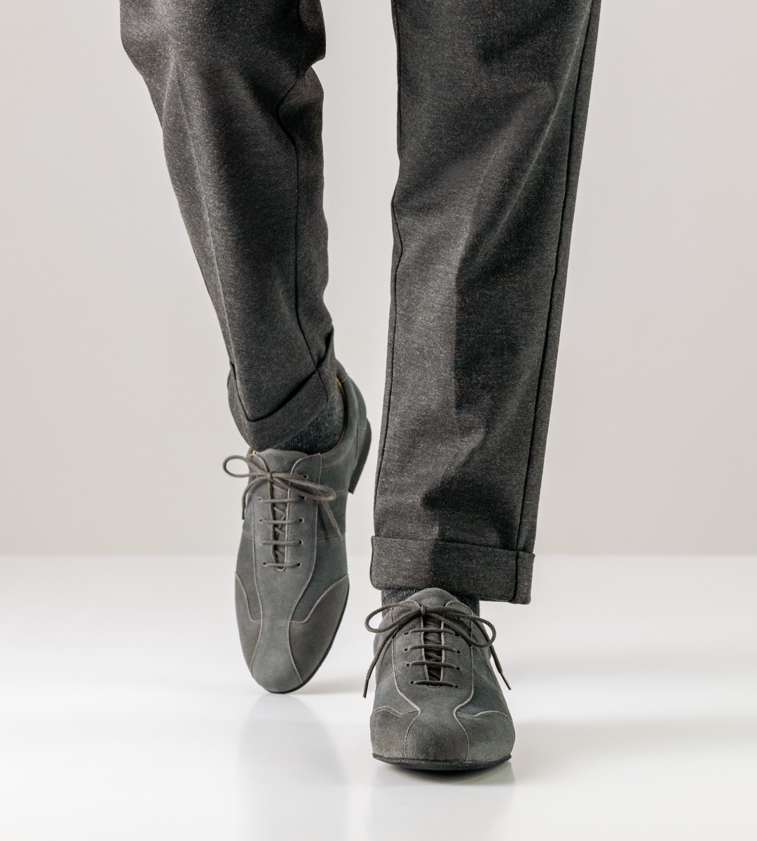 Grey trousers in combination with Sneaker Men's dance shoe by Werner Kern