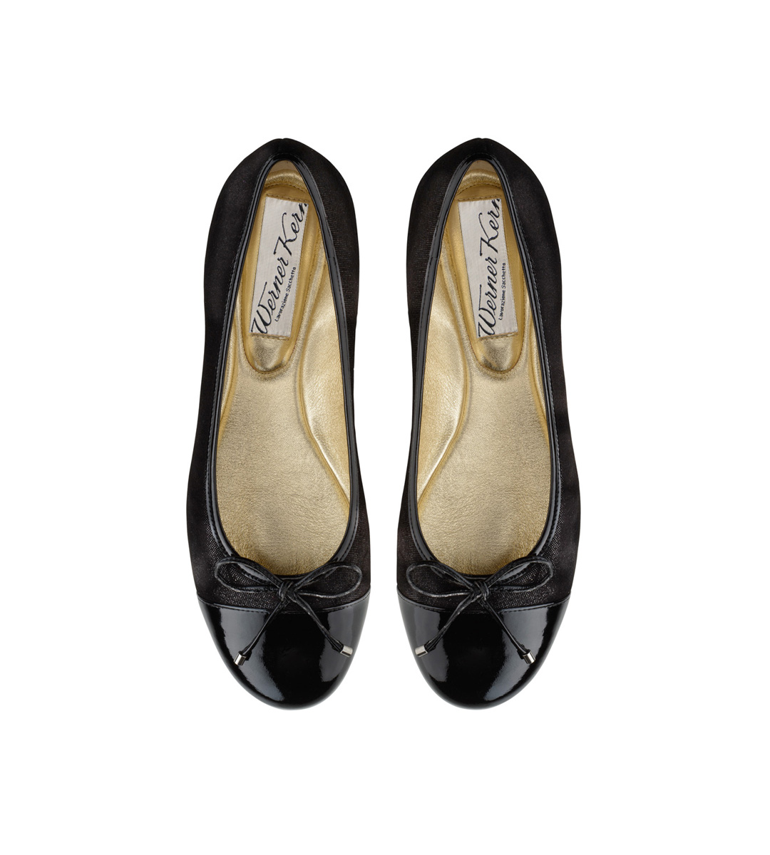 Jil A woman wears ballerinas in shiny black velour