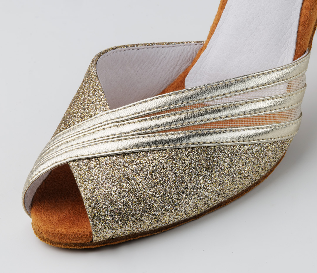Dance shoe in gold with a slightly asymmetrical design in a gorgeous combination of materials and a 6 cm heel
