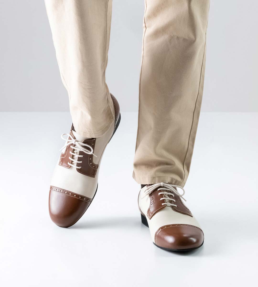 Bergamo Men's dance shoe by Werner Kern in brown-beige in combination with beige trousers