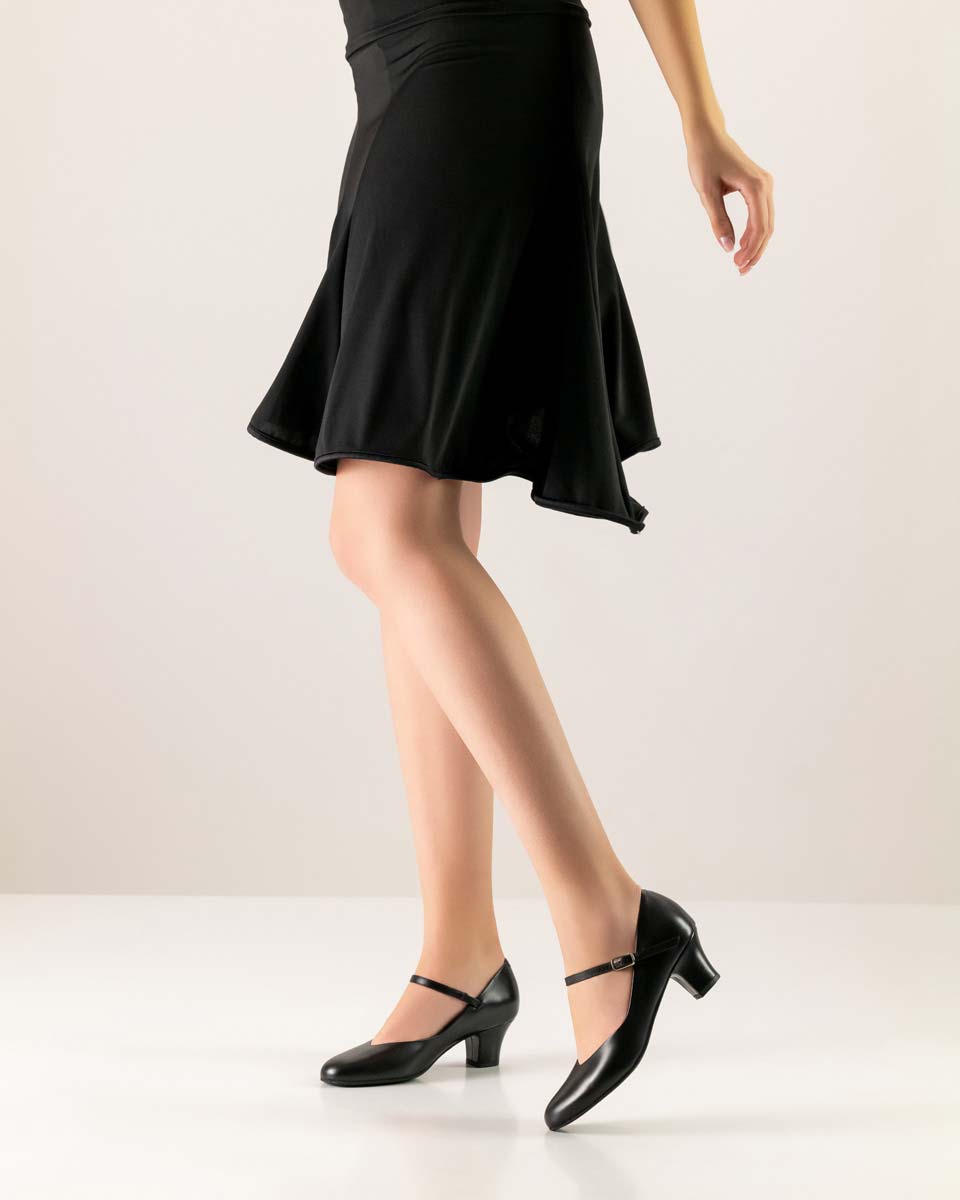 Gina Comfortable women's dance shoe by Werner Kern photographed with a black dress