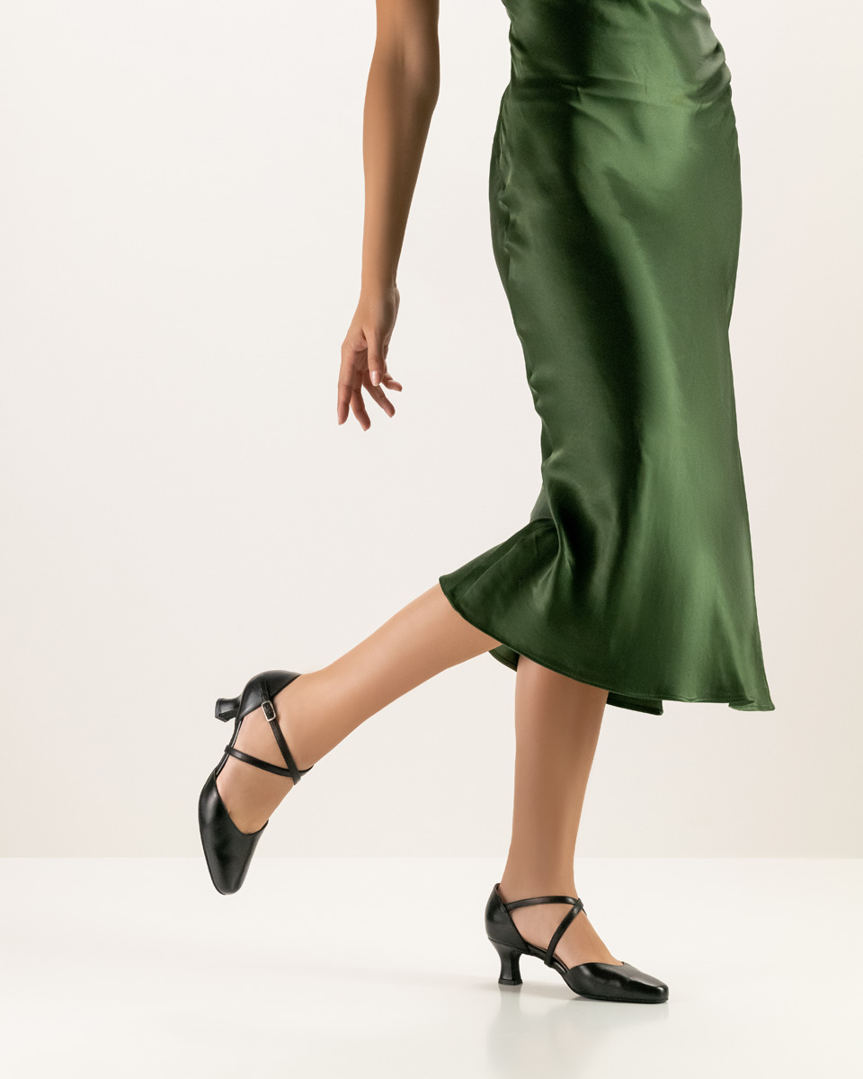 Long skirt in green in combination with classic Werner Kern ladies' dance shoe
