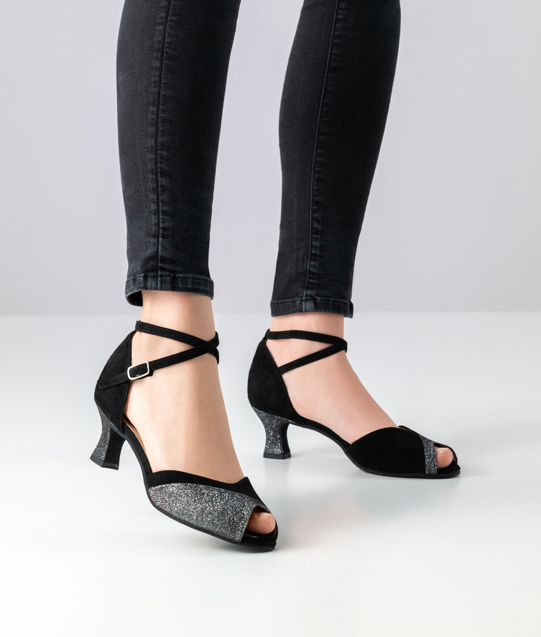 Steph Open, elegant dance shoe in asymmetric design in black-silver with 5.5 cm heel by Werner Kern.