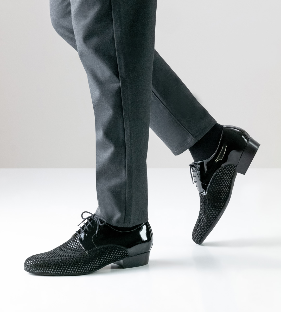 Nueva Epoca Men's Dance Shoe in Black with Grey Trousers