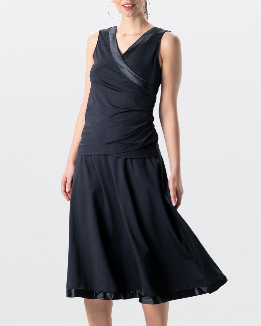 Wide midi-length dance skirt in black by Werner Kern with satin trim at the hem, suitable for all types of dance