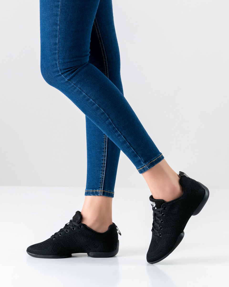 Blue jeans in combination with black salsa ladies dance sneakers by Suny