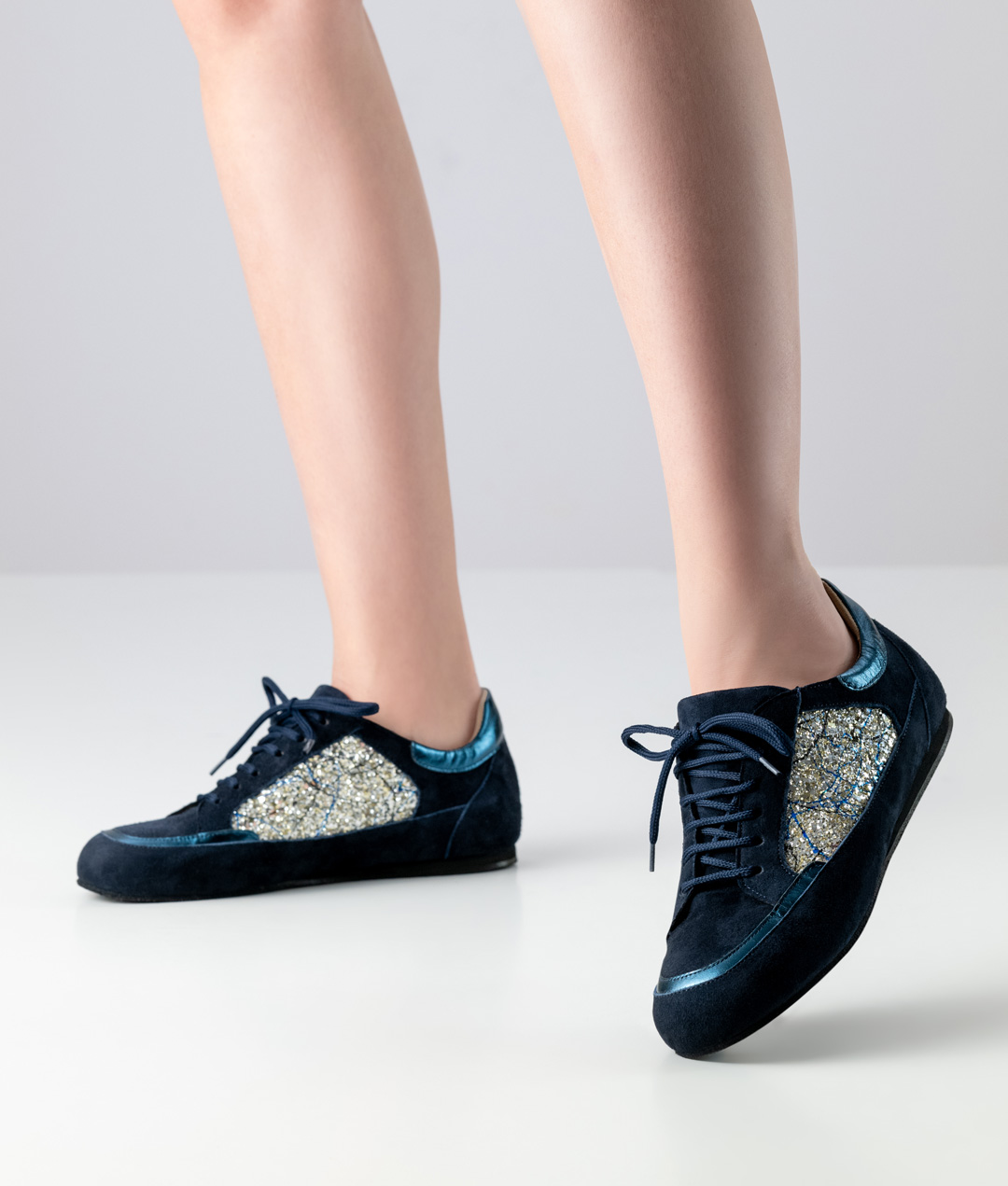 Carol, dark blue suede dance sneaker with brocade inserts and removable insole by Werner Kern.