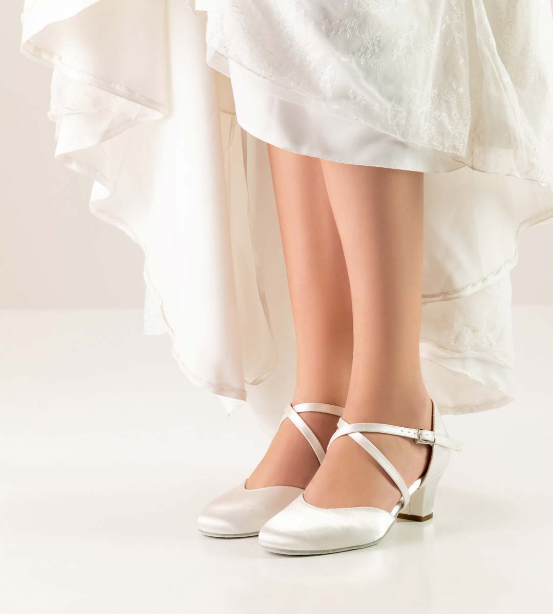 Felice white wedding dress in combination with Werner Kern bridal shoe