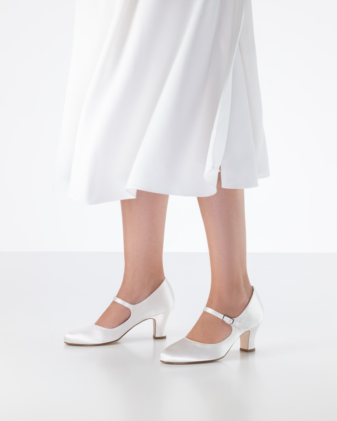 Ashley Wedding dress in combination with white Werner Kern bridal shoe with leather sole