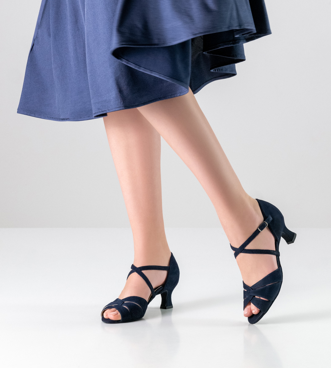 Blue skirt in combination with open Werner Kern ladies dance shoe in blue