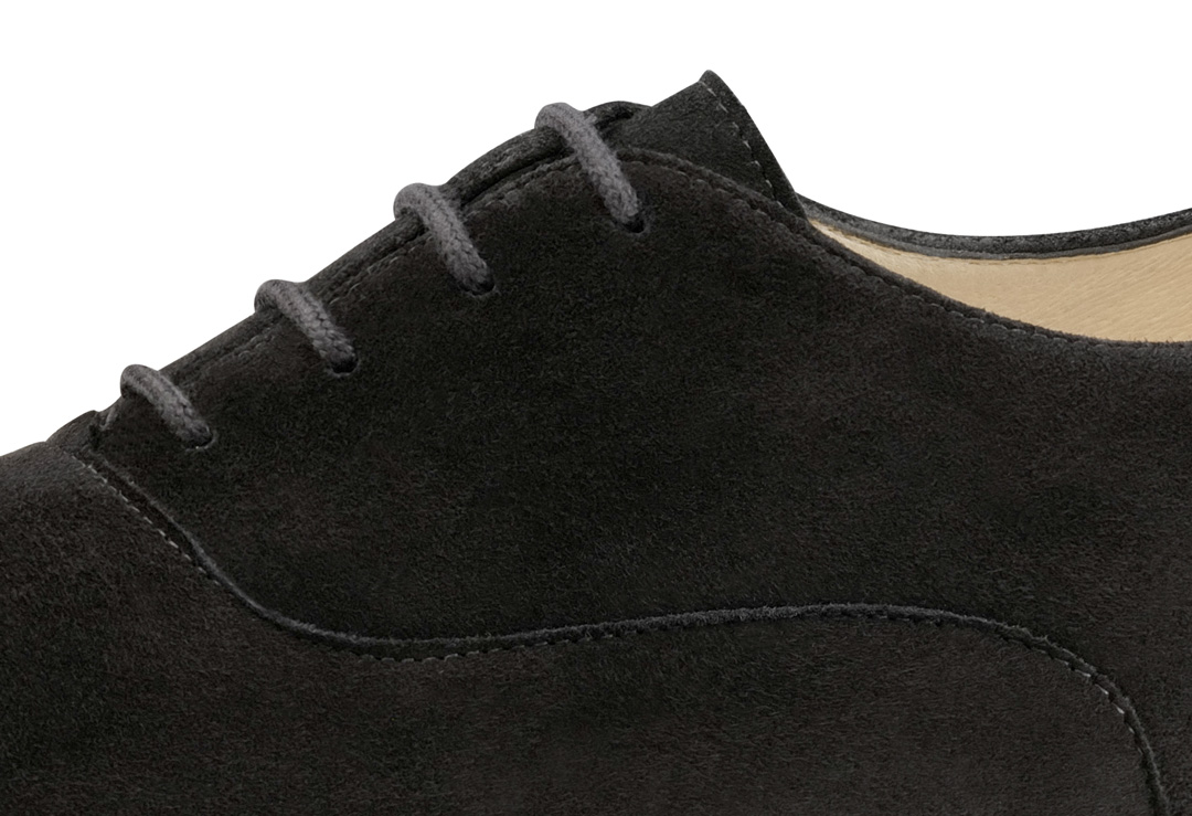 Detailed view of women's suede dance shoe with laces by Werner Kern