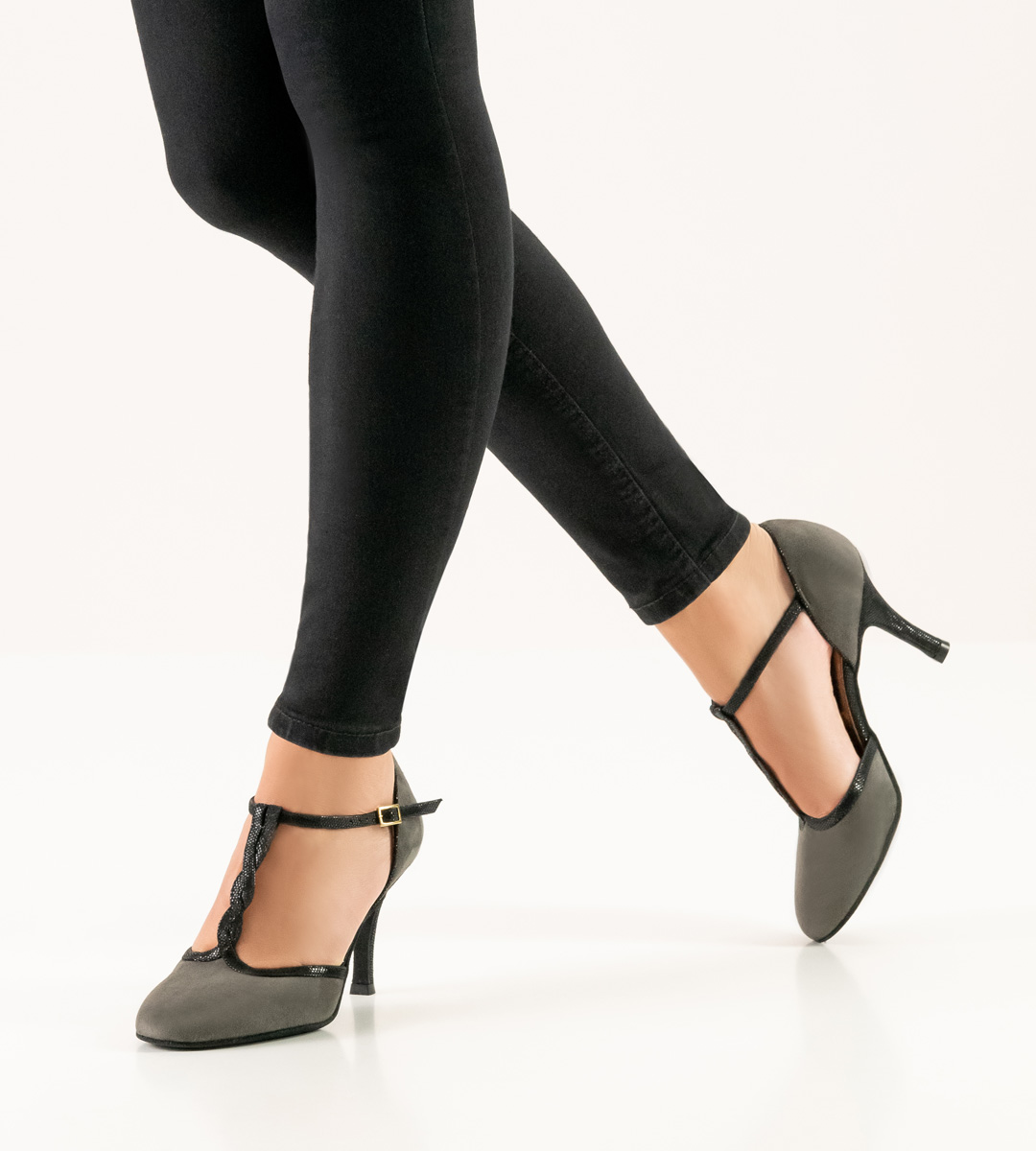 Grey women's dance shoe by Nueva Epoca in combination with black and trousers in black