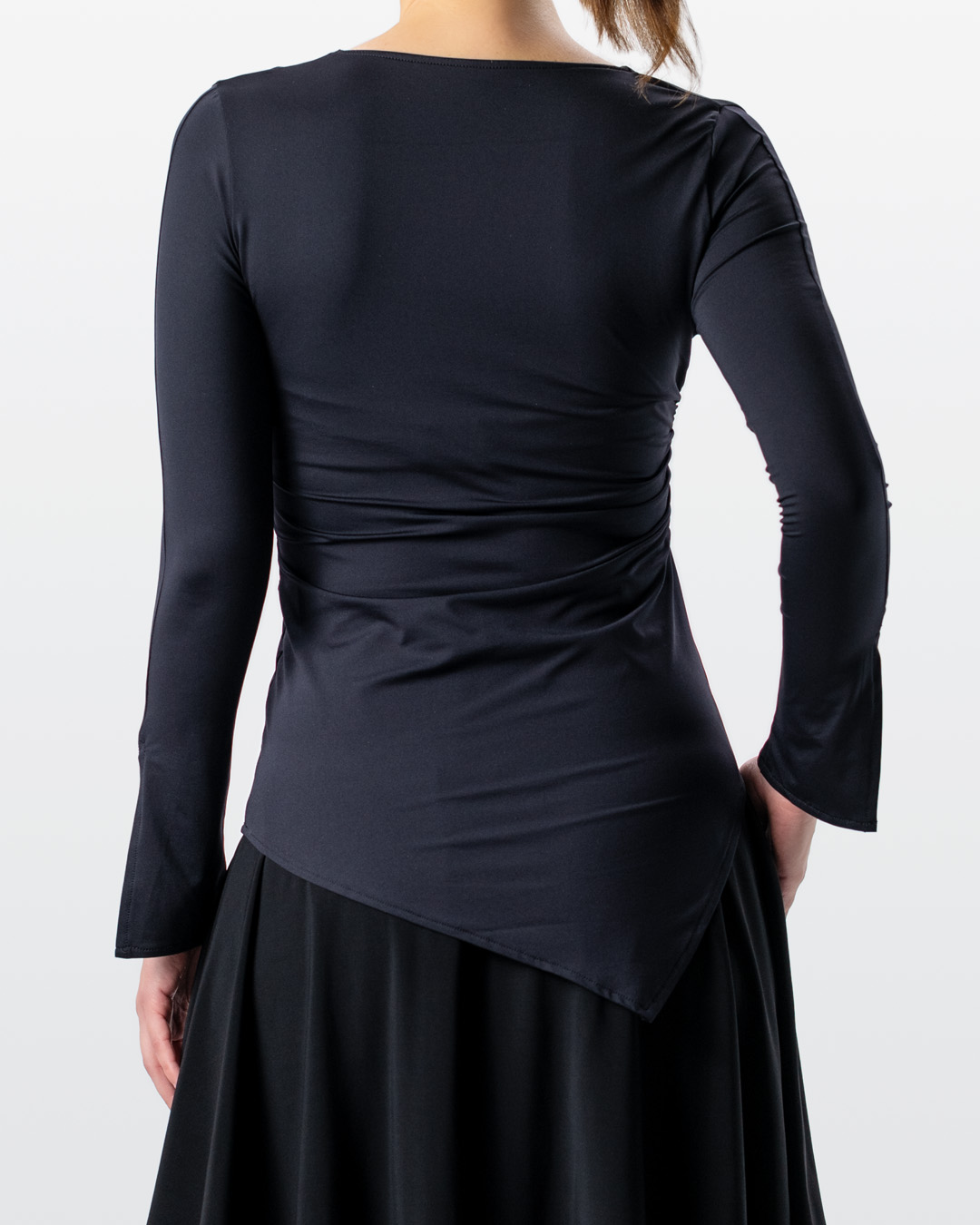 Rear view of asymmetrically cut dance top by Werner Kern in black