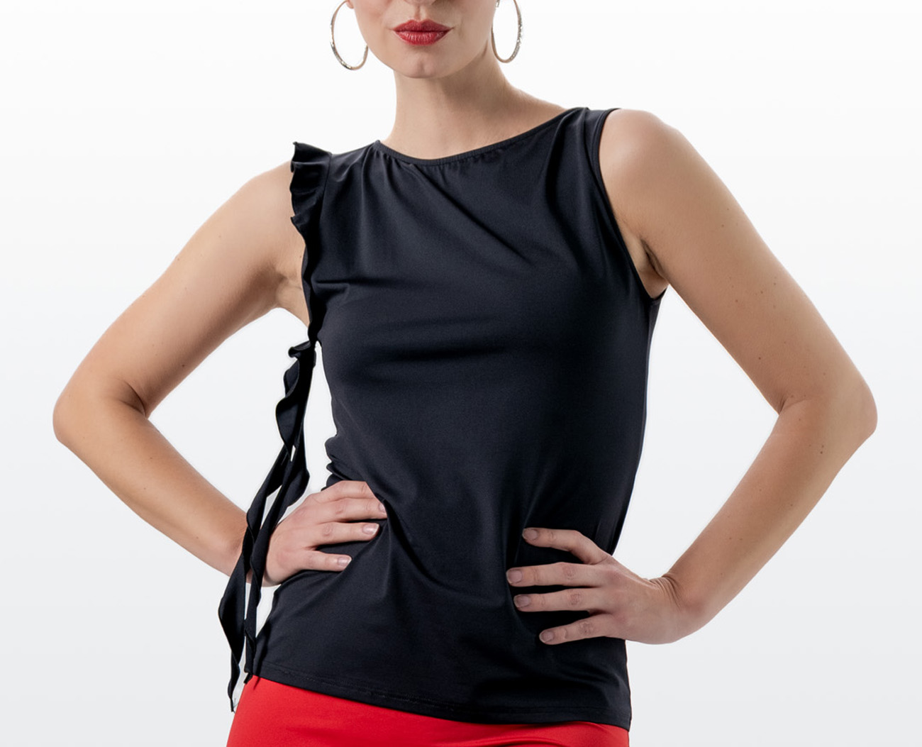 Black, slim-fit dance top with ruffled sleeves on the right by Werner Kern