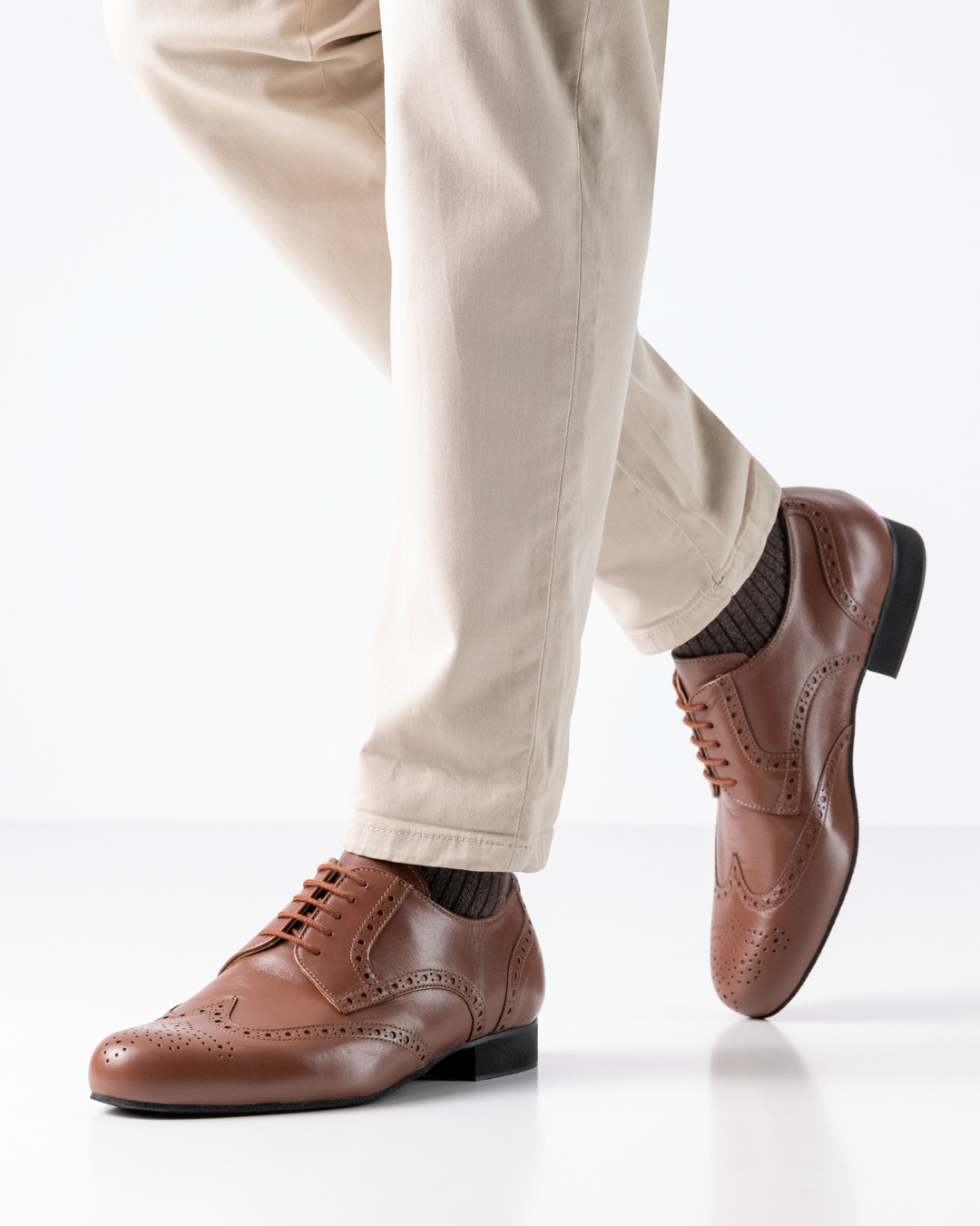 Cognac-coloured men's dance shoe made of nappa leather with perforated pattern by Werner Kern