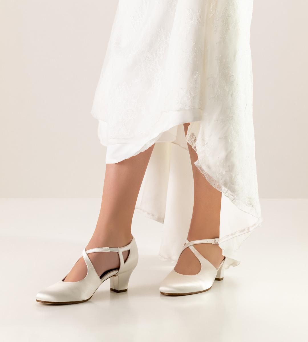 "Werner Kern bridal shoe with leather sole in combination with white wedding dress "
