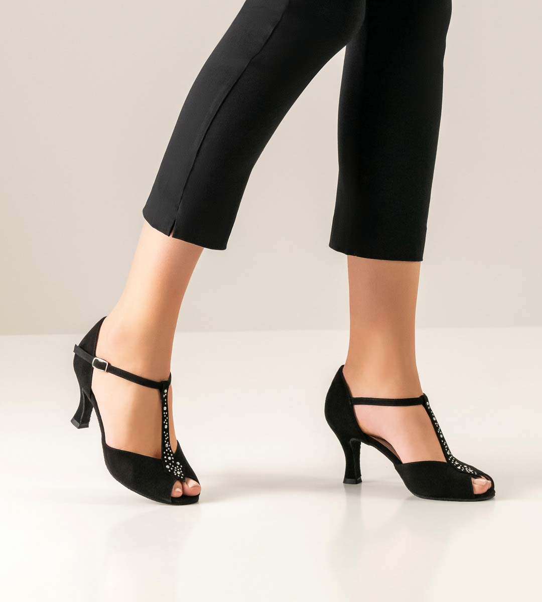Claudia Werner Kern ladies dance shoe with T-Strap and black jeans