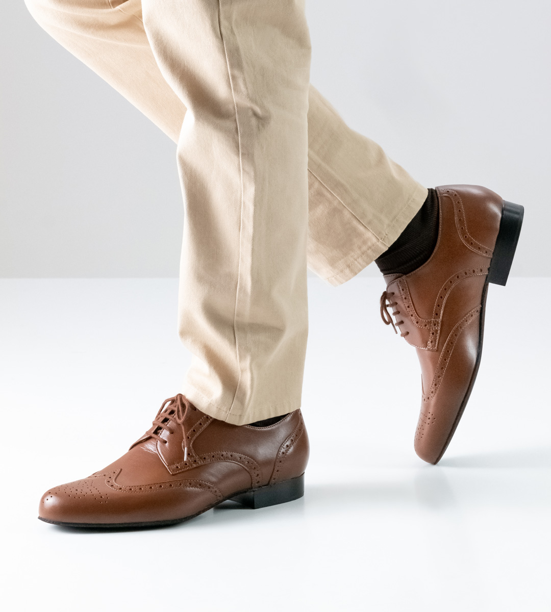 Light trousers in combination with cognac coloured Werner Kern men's dance shoe