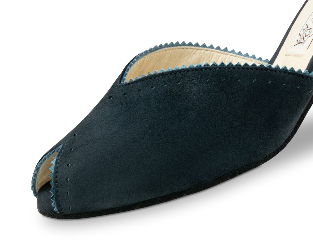 The toe of a blue suede dance shoe with a peep-toe cut-out and embellishments