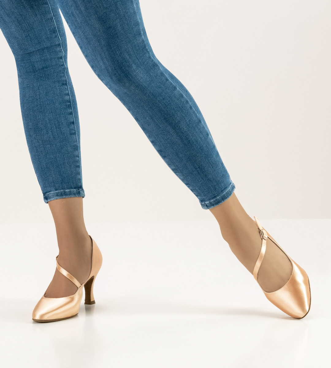 Blue jeans in combination with Werner Kern women's dance shoe in satin