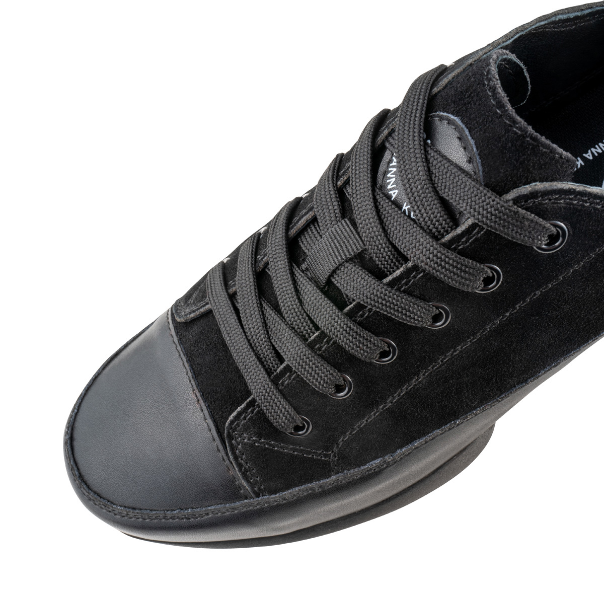 Detailed view of the black women's dance shoe by Suny in leather and suede