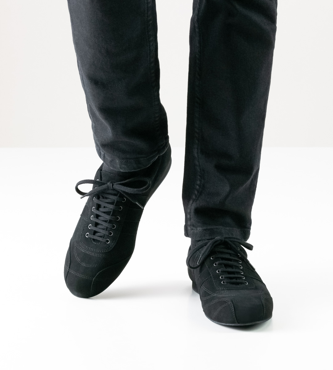 black jeans in combination with men's dance shoe sneaker in black