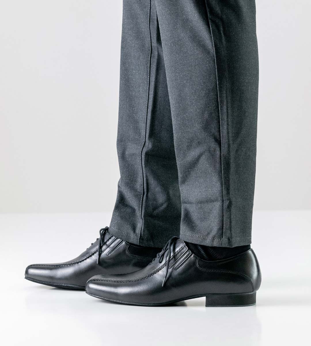 Pesaro 2 cm high Werner Kern men's dance shoe in leather with grey trousers