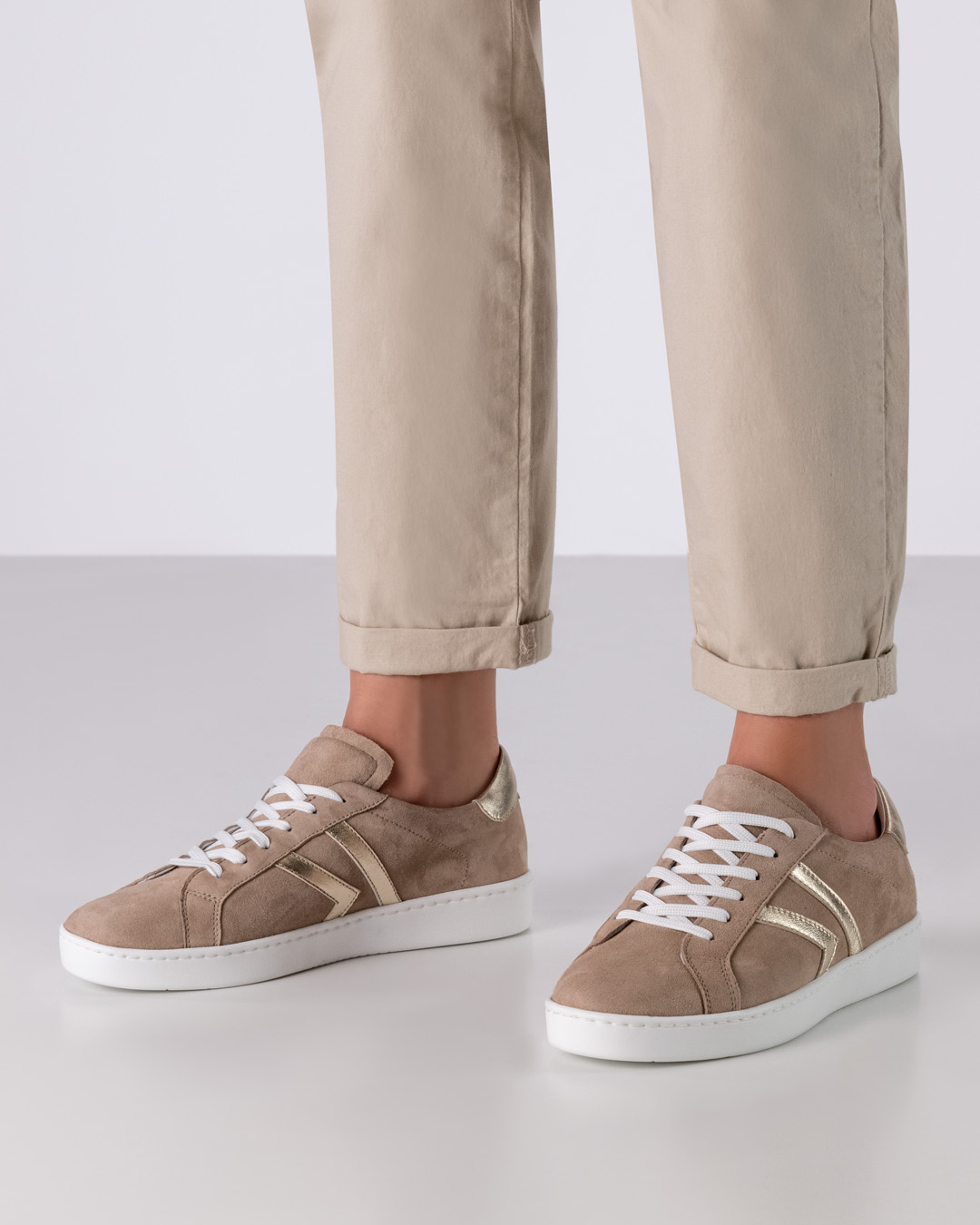 Beige dance sneakers with gold details and white PU dance sole by Werner Kern