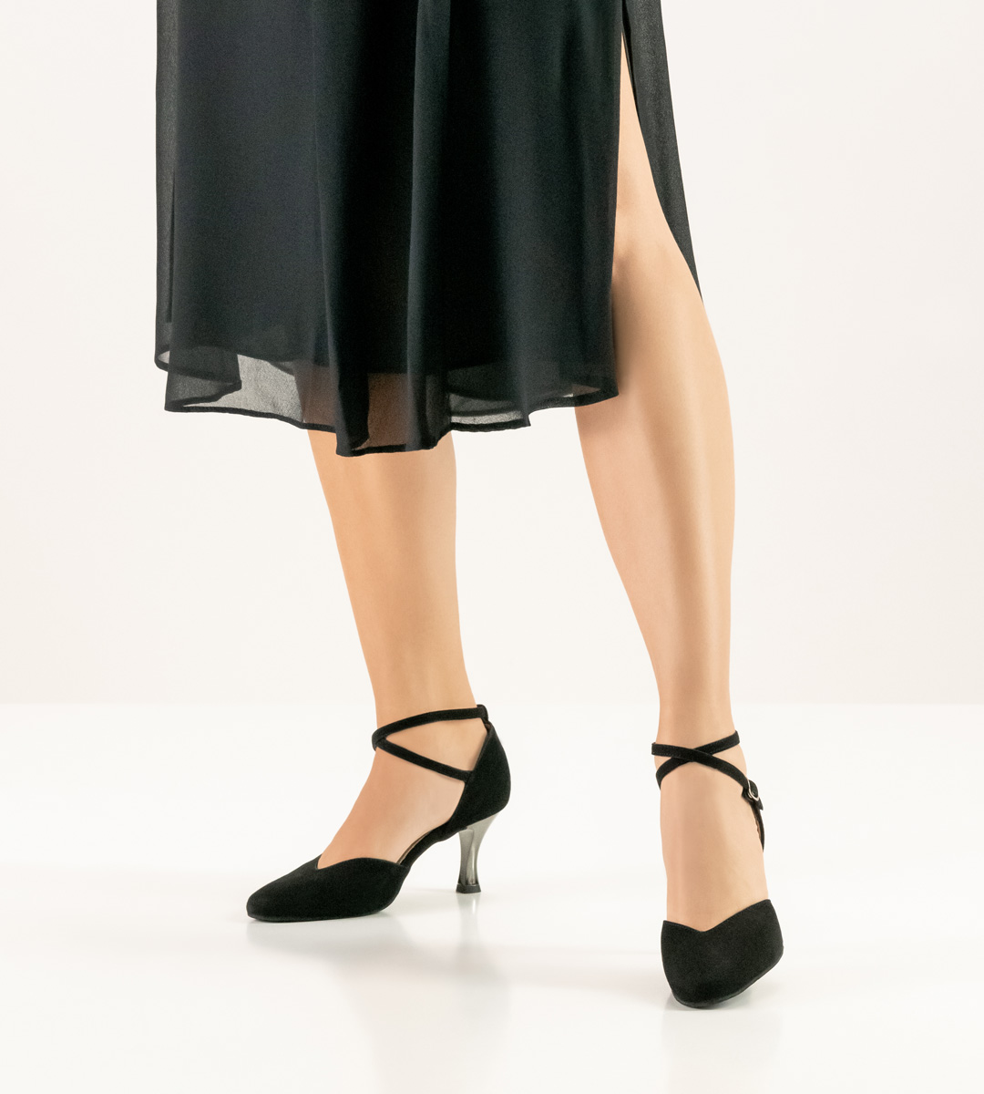 black skirt in combination with Werner Kern ladies' dance shoe and ankle strap