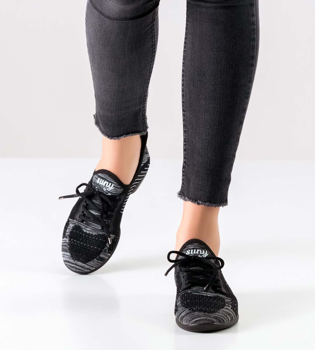 110 Black jeans in combination with linedance dance sneakers for women by Suny