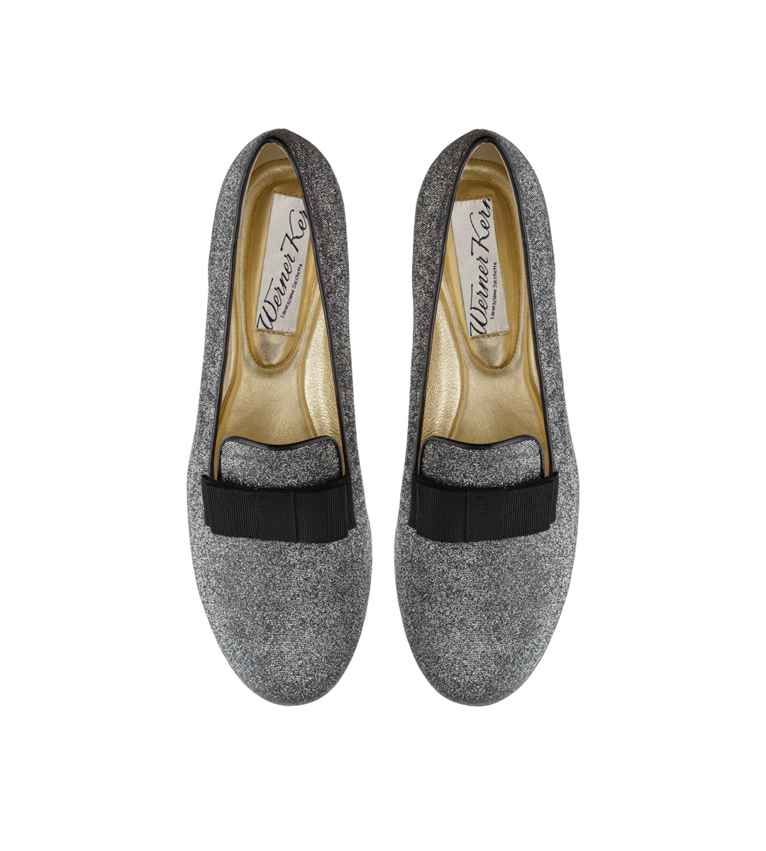 Loafer Linn A young woman wears the Linn loafer in glitter